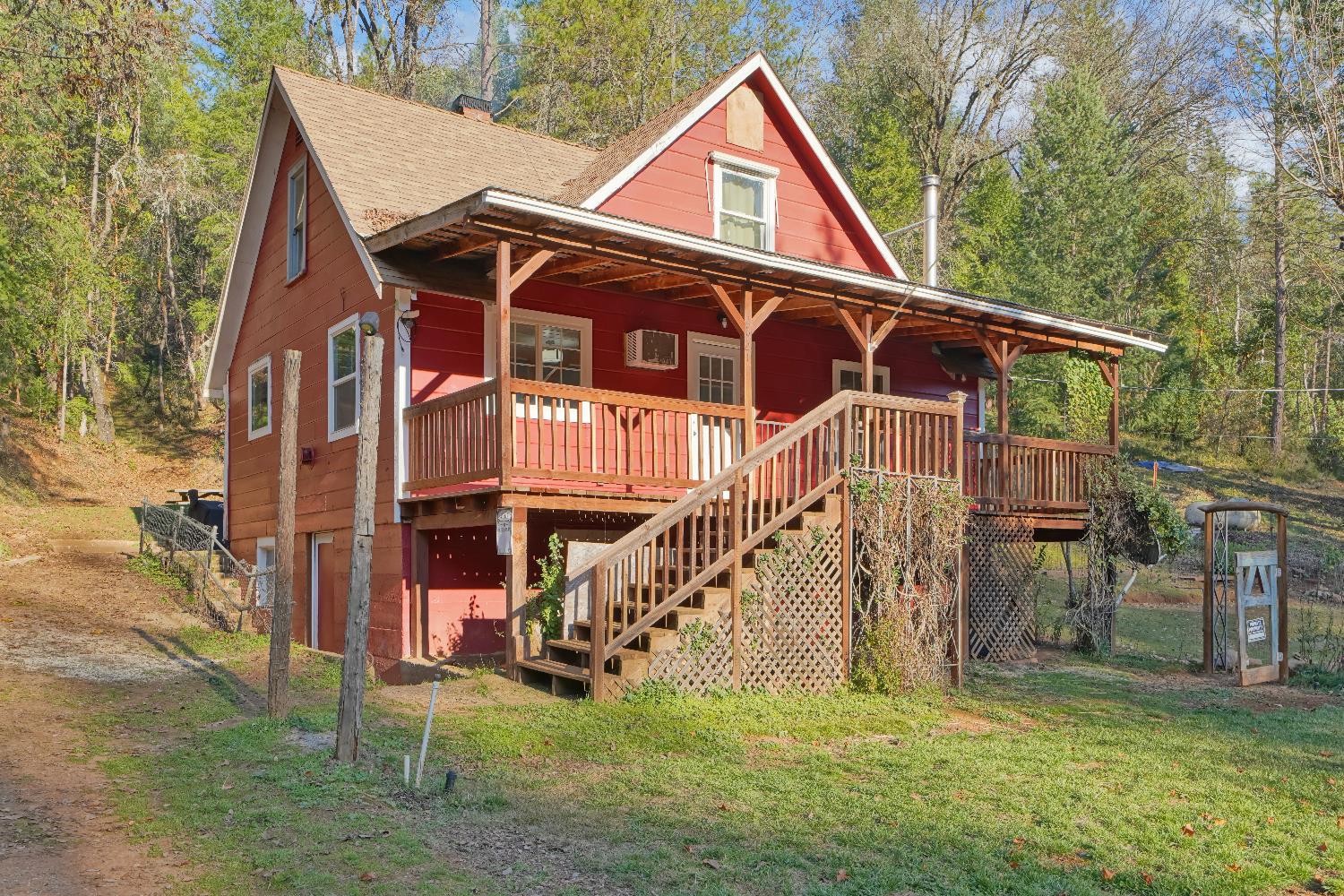 5921 Bear Creek Road Garden Valley, CA 95633 - Photo 34 of 55 a view of a house with a yard