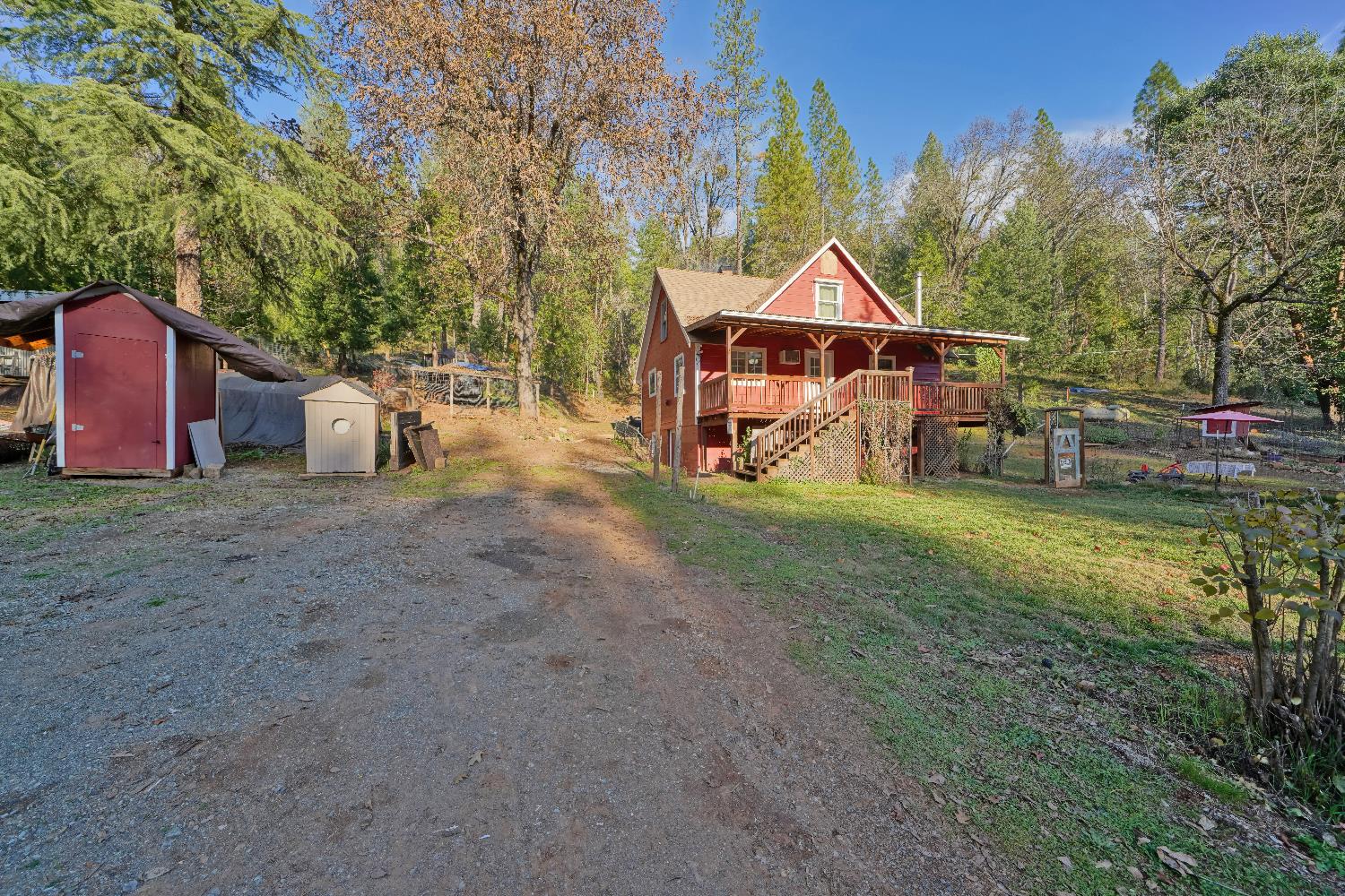 5921 Bear Creek Road Garden Valley, CA 95633 - Photo 36 of 55 a view of a house with a yard and sitting area