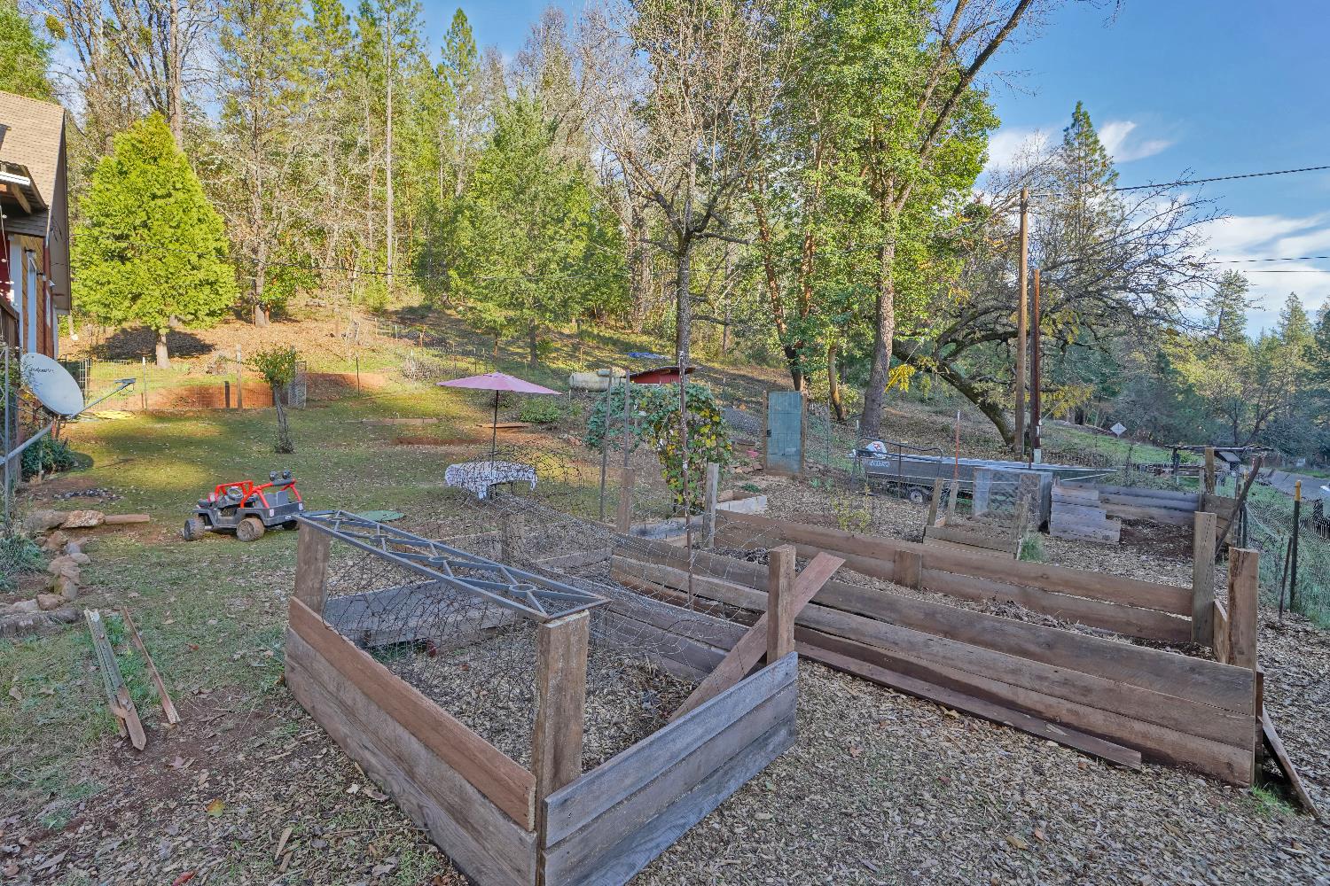 5921 Bear Creek Road Garden Valley, CA 95633 - Photo 42 of 55 a view of a wooden bridge