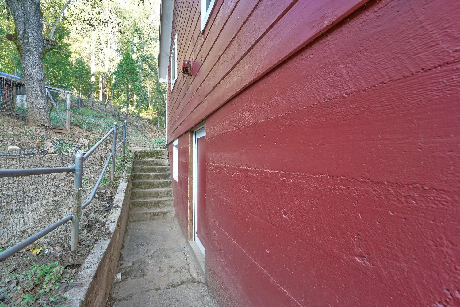 5921 Bear Creek Road Garden Valley, CA 95633 - Photo 48 of 55 Outside stairs to basement. There is a set of stairs INSIDE that lead to the basement, too.