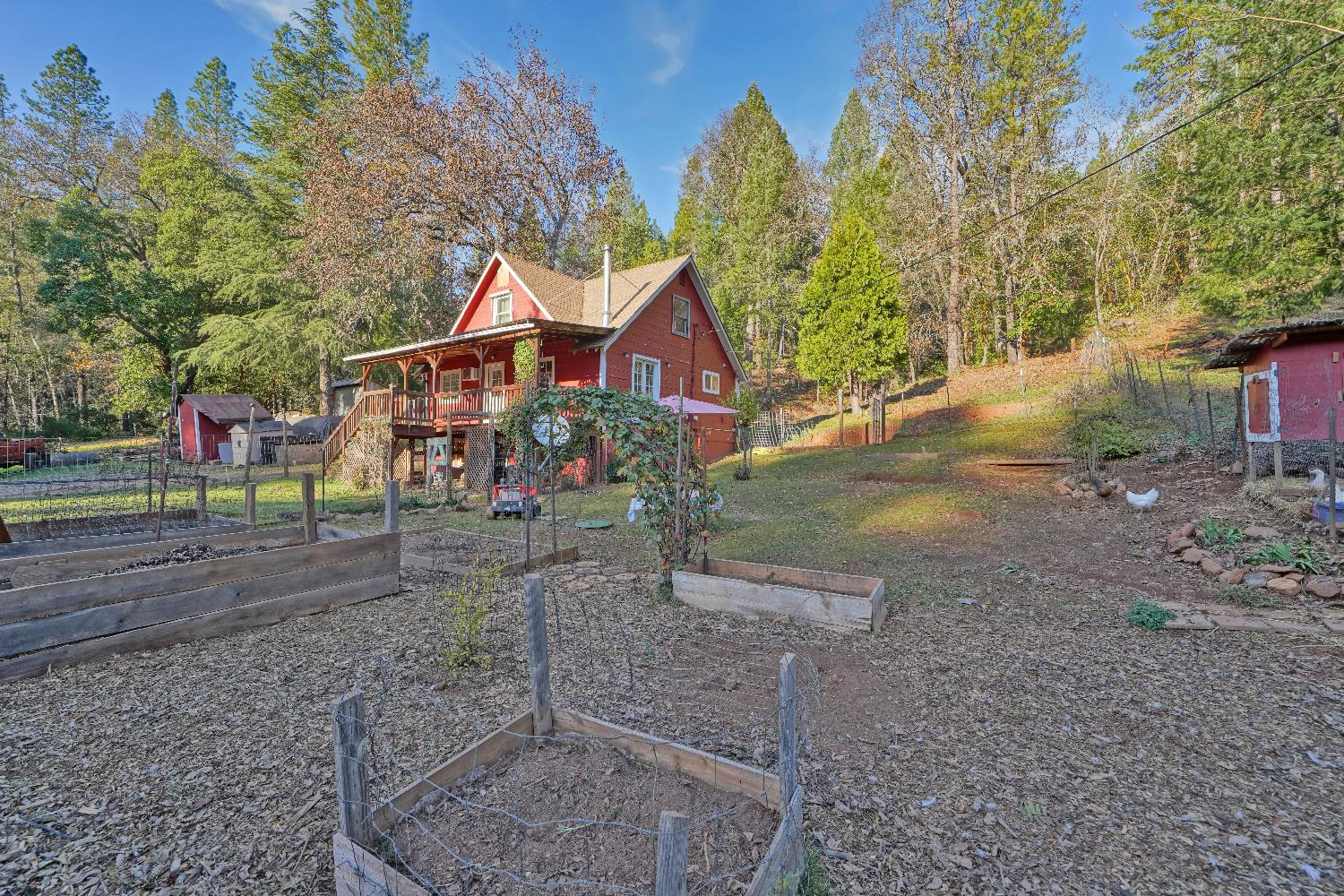 5921 Bear Creek Road Garden Valley, CA 95633 - Photo 5 of 55 a front view of a house with a yard