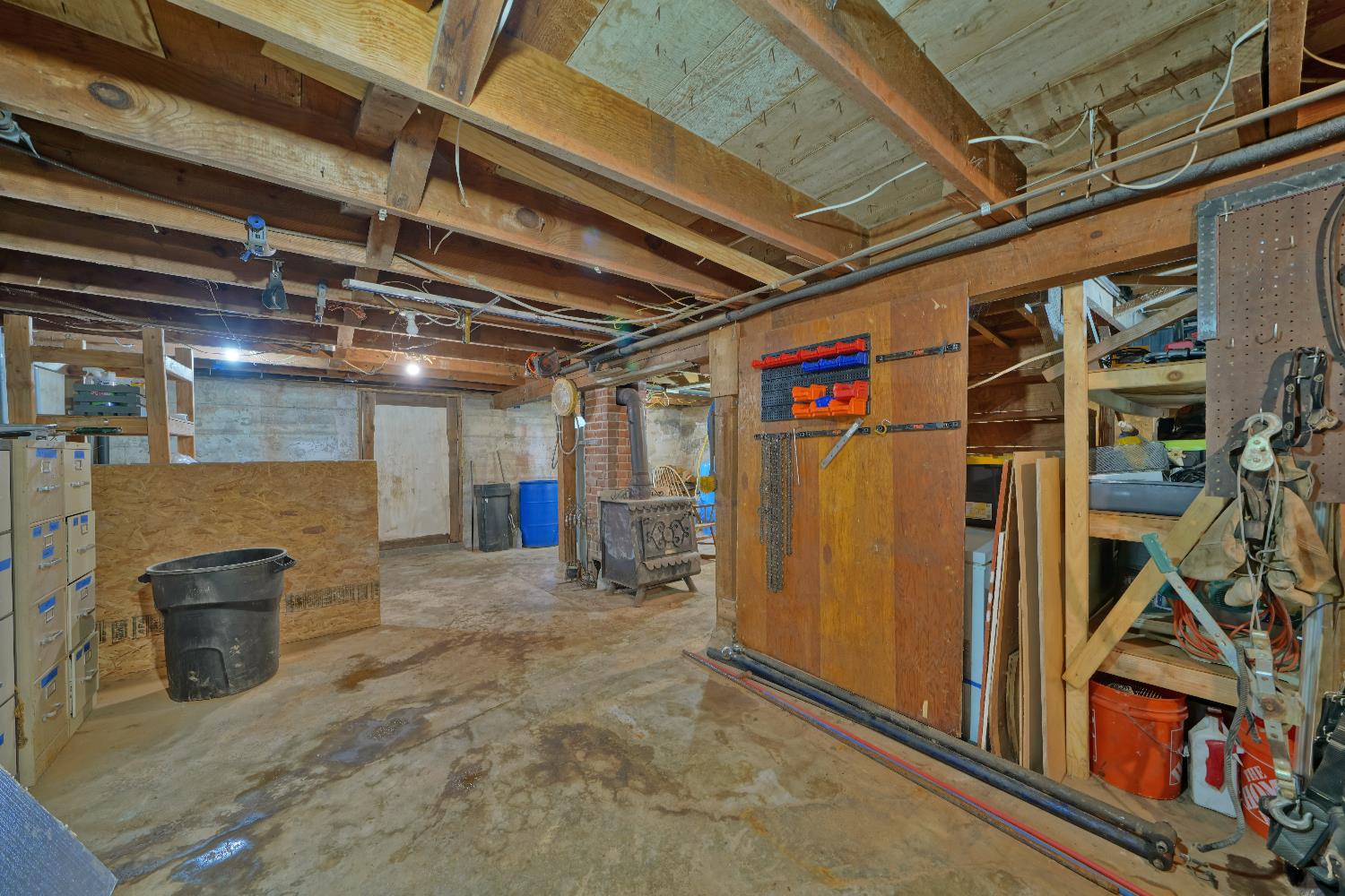 5921 Bear Creek Road Garden Valley, CA 95633 - Photo 54 of 55 a view of an empty room with wooden walls