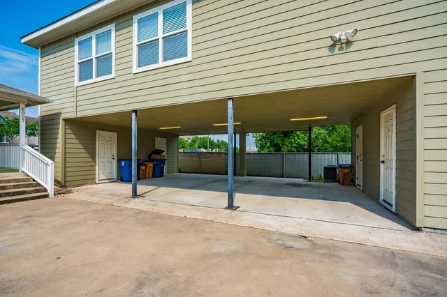 a house view with a backyard space