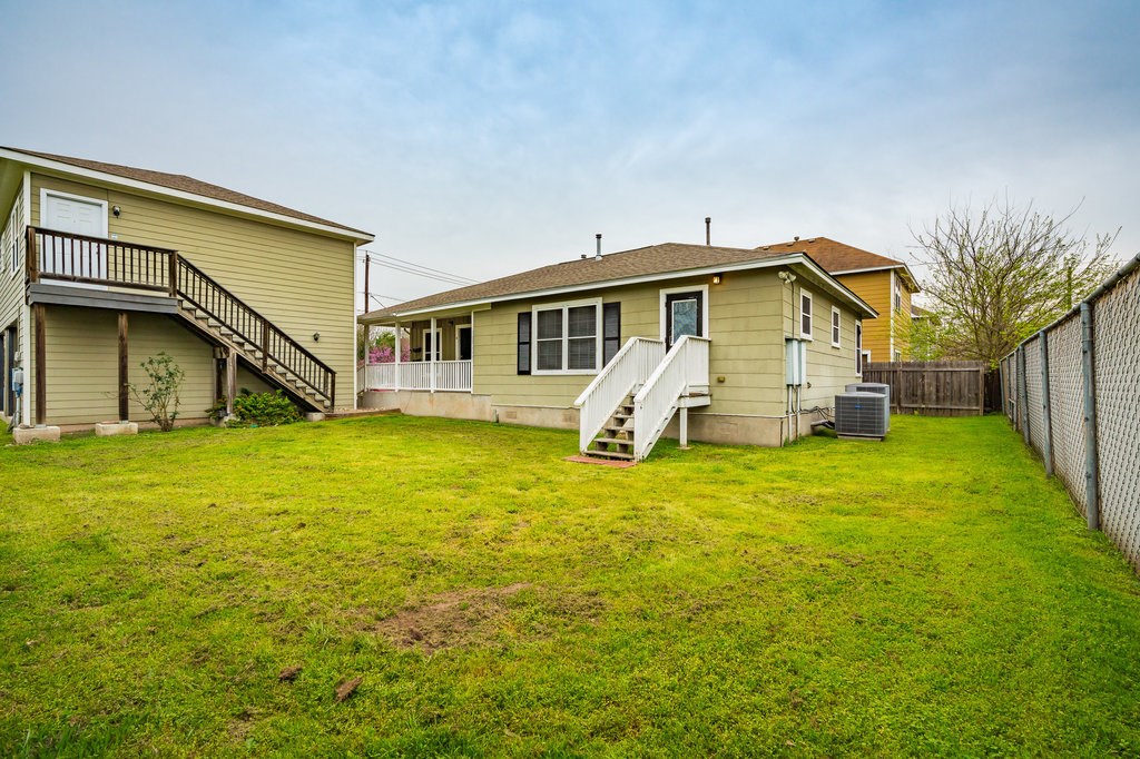 6007 Fairway Street, Unit C Austin, TX 78741 - Photo 22 of 22 a view of a house with a yard and sitting area