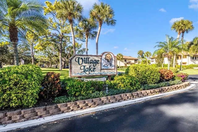 a view of a swimming pool with a lounge chairs