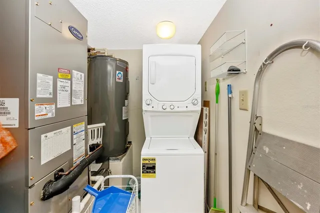 a front view of a house with a garden and outdoor seating