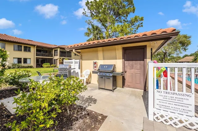 swimming pool view with a outdoor seating space
