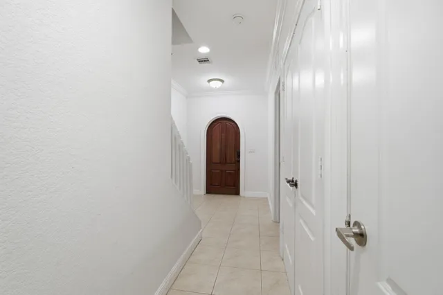 a view of a hallway with closet