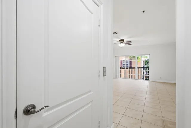 a view of a hallway with closet
