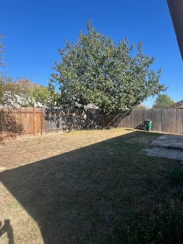 a view of outdoor space and yard