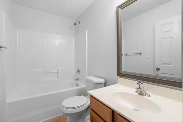 a bathroom with a sink toilet and a bathtub