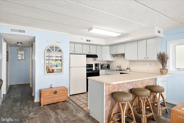 a view of balcony with furniture