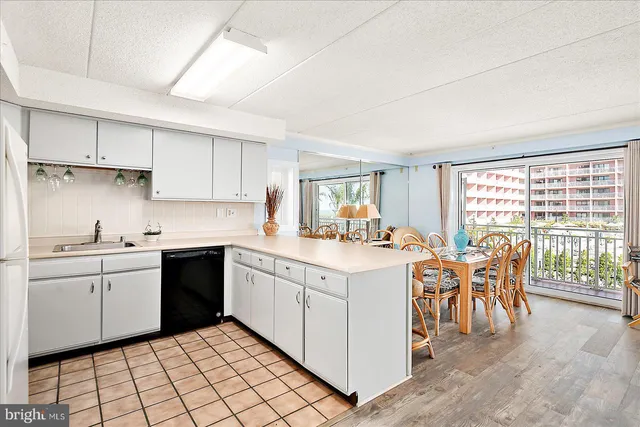 a view of living room with furniture and window