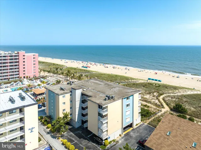 a view of a city with an ocean view