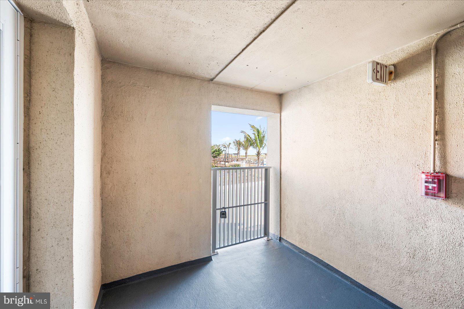 1 66th Street, Unit 101 Ocean City, MD 21842 - Photo 34 of 54 a view of an empty room with a window