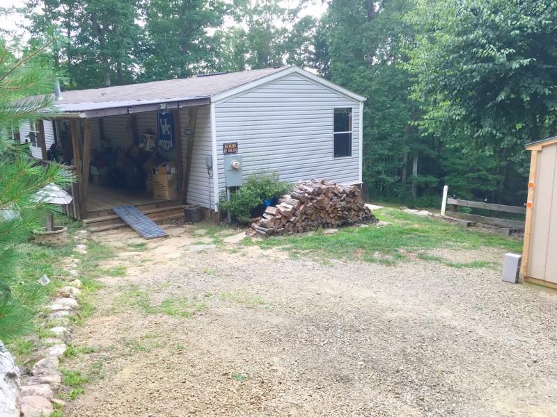 213 Midkiff Road Southeast Floyd, VA 24091 - Photo 2 of 20 a view of a back yard of the house