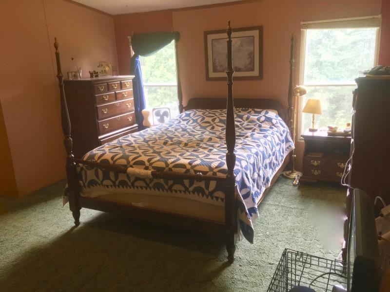213 Midkiff Road Southeast Floyd, VA 24091 - Photo 15 of 20 a bedroom with a bed and a window