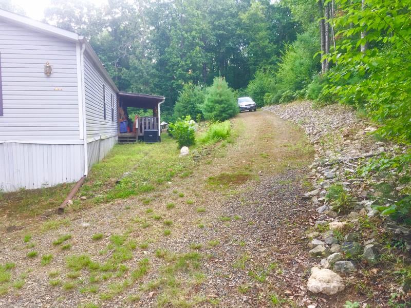 213 Midkiff Road Southeast Floyd, VA 24091 - Photo 5 of 20 a view of a house with a yard