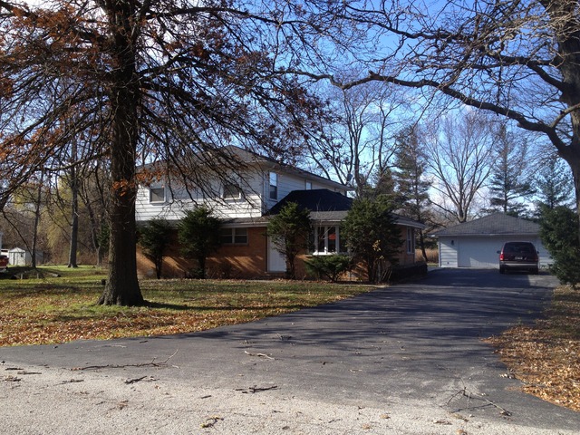 20232 Keystone Avenue Matteson, IL 60443 - Photo 1 of 1 a view of street with tree s