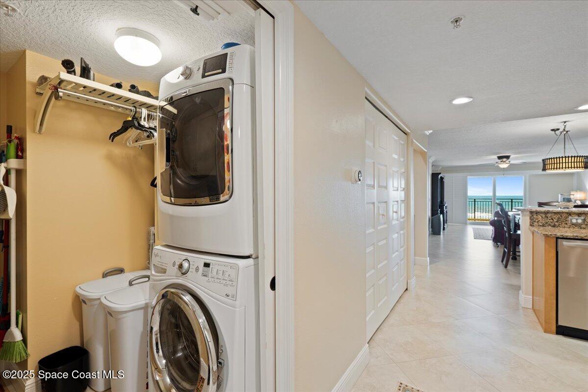 2375 South Atlantic Avenue, Unit 302 Cocoa Beach, FL 32931 - Photo 21 of 36 a view of a hallway with washer and dryer