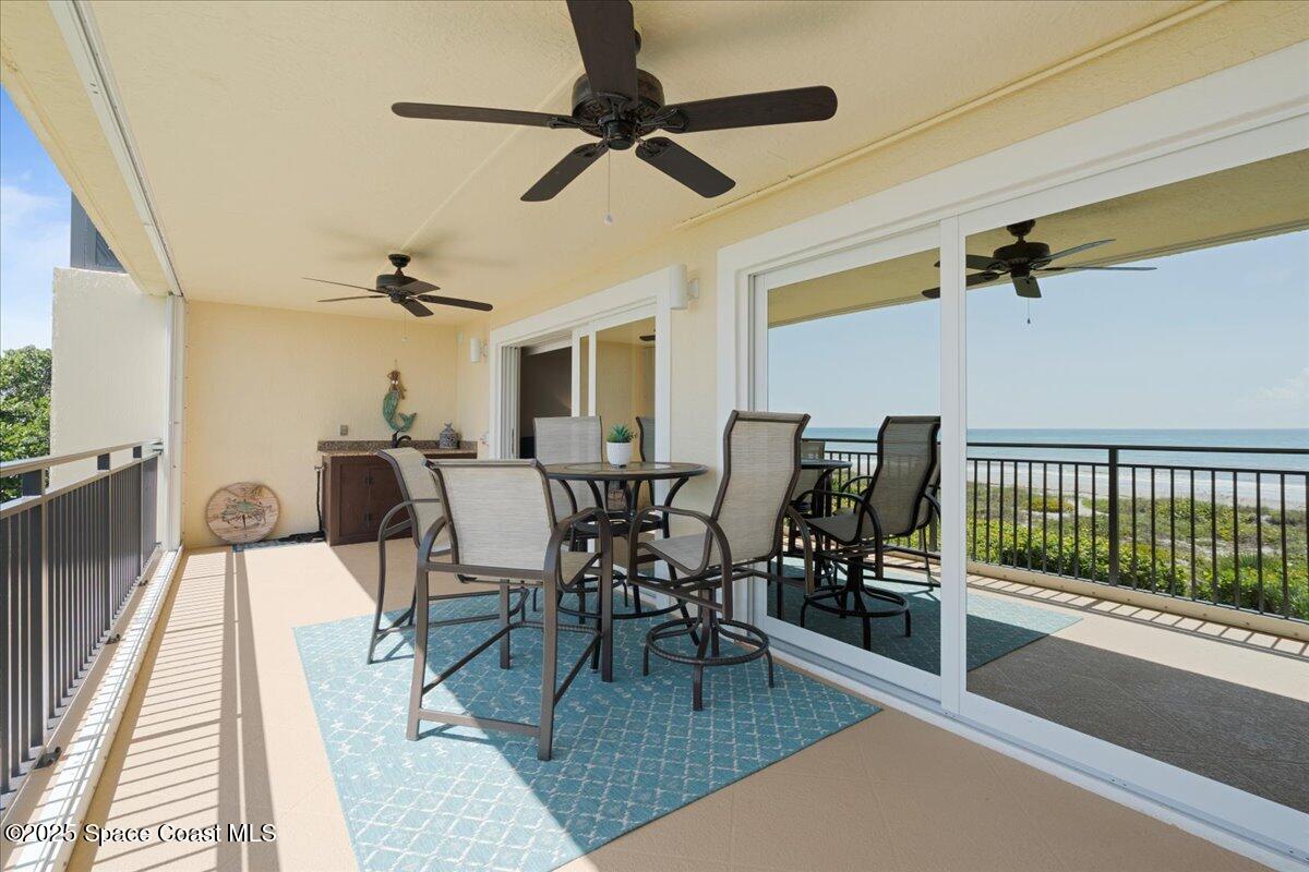 2375 South Atlantic Avenue, Unit 302 Cocoa Beach, FL 32931 - Photo 22 of 36 a view of a dining room with furniture