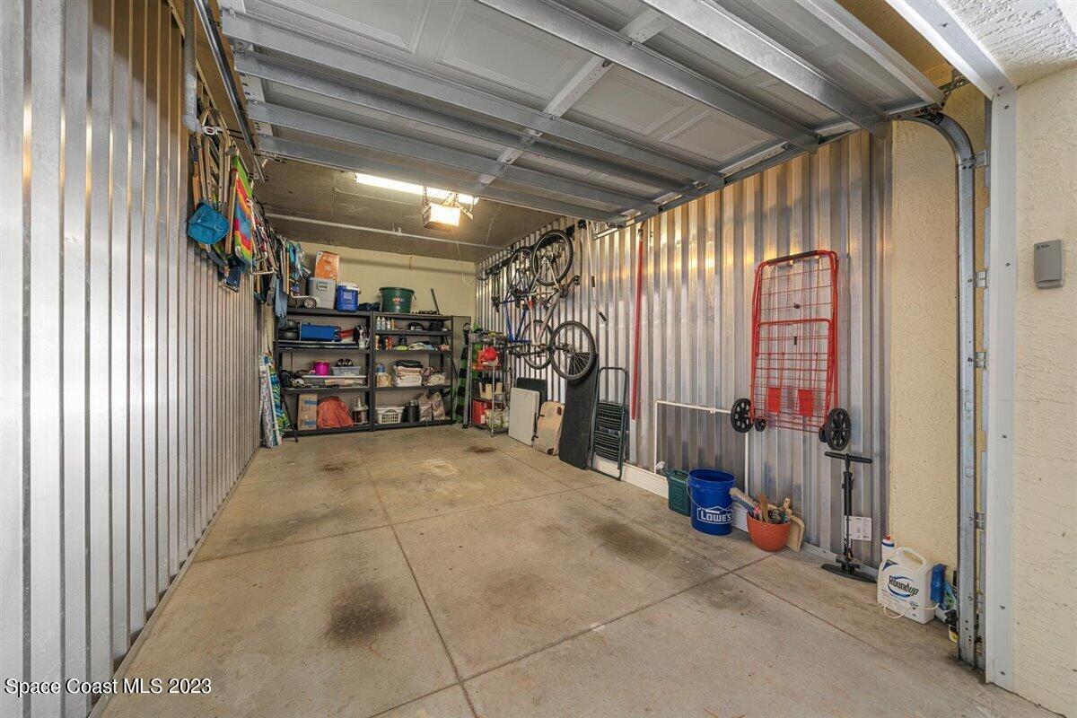 2375 South Atlantic Avenue, Unit 302 Cocoa Beach, FL 32931 - Photo 30 of 36 a view of empty room with wooden floor