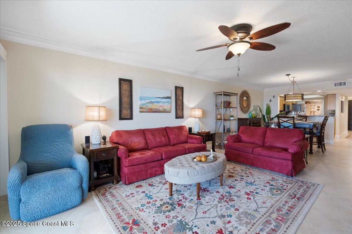 2375 South Atlantic Avenue, Unit 302 Cocoa Beach, FL 32931 - Photo 5 of 36 a living room with furniture