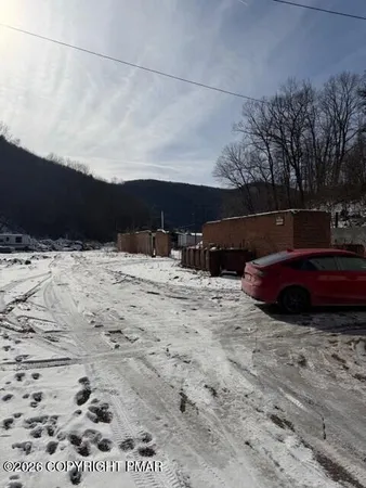 a view of snow on the beach
