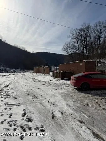 a view of swimming pool with a yard