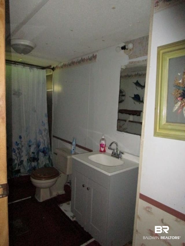 20705 Greek Cemetery Road Robertsdale, AL 36567 - Photo 19 of 25 Full bath with vanity and toilet