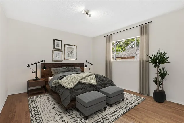 a bed room with a bed and a couch