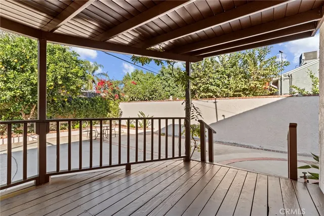 a view of porch with wooden floor