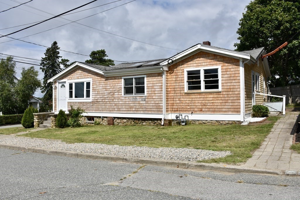 4 Wellington Road Wareham, MA 02558 - Photo 6 of 35 a front view of a house with a yard