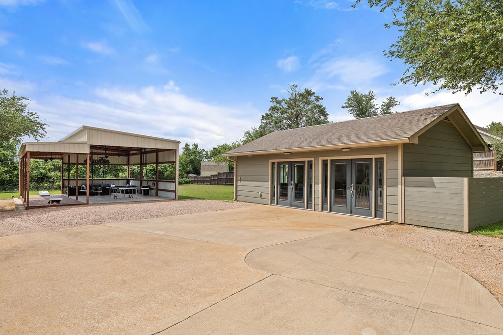12135 Fitzhugh Road Austin, TX 78736 - Photo 16 of 30 front view of a house with a garden