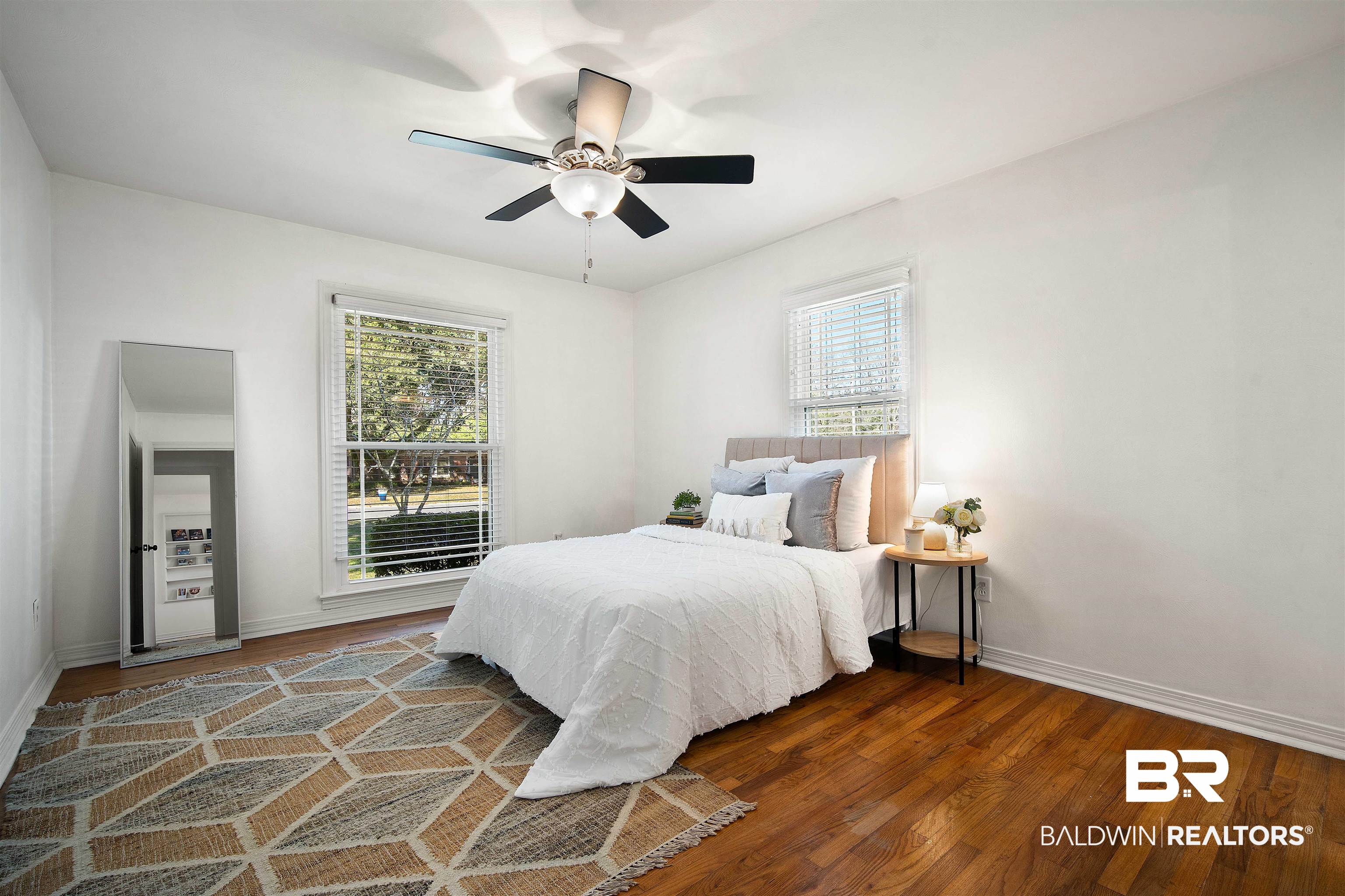 2615 Walton Avenue Mobile, AL 36606 - Photo 24 of 33 Bedroom with ceiling fan, wood finished floors, and baseboards