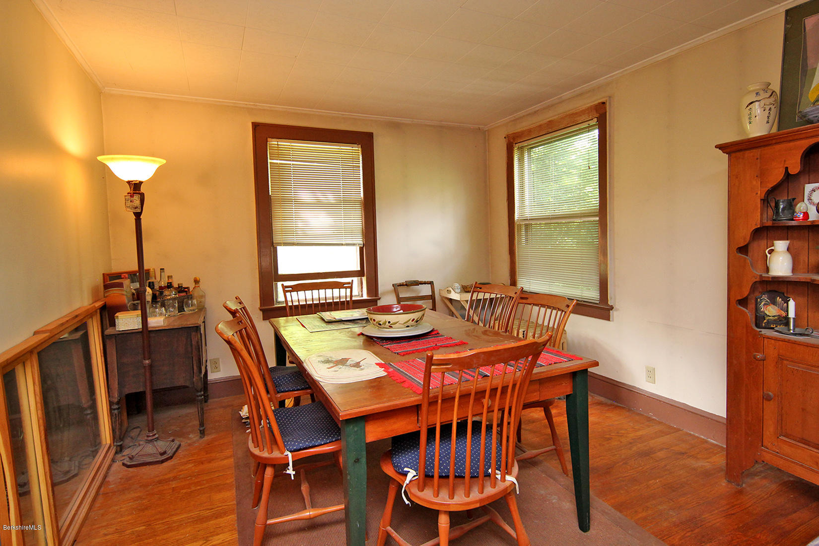 1455 State Road Richmond, MA 01254 - Photo 14 of 15 a dining room with furniture and wooden floor