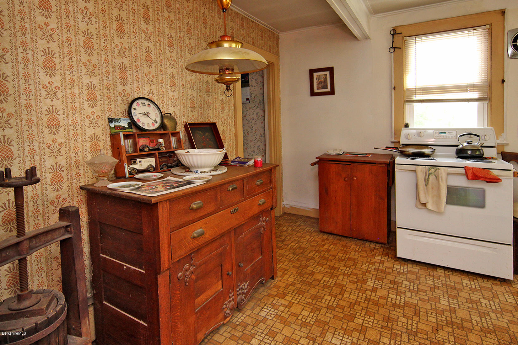 1455 State Road Richmond, MA 01254 - Photo 15 of 15 a kitchen with stainless steel appliances granite countertop a stove a sink and a microwave