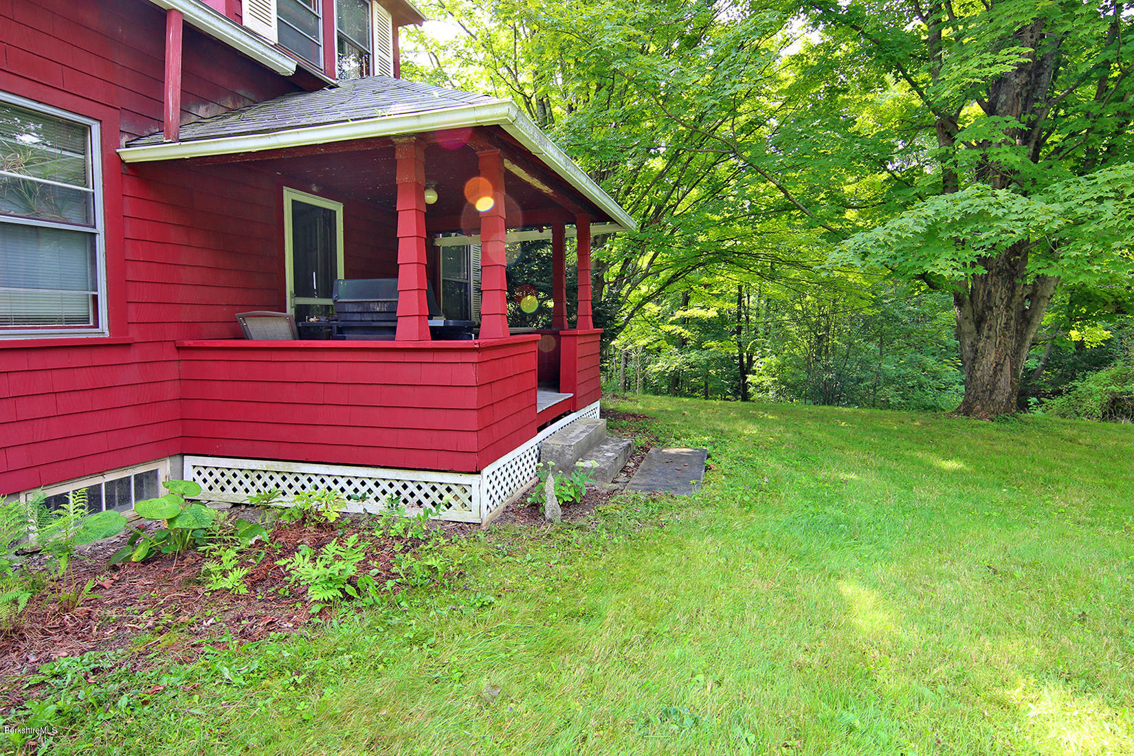 1455 State Road Richmond, MA 01254 - Photo 7 of 15 a view of a house with a yard