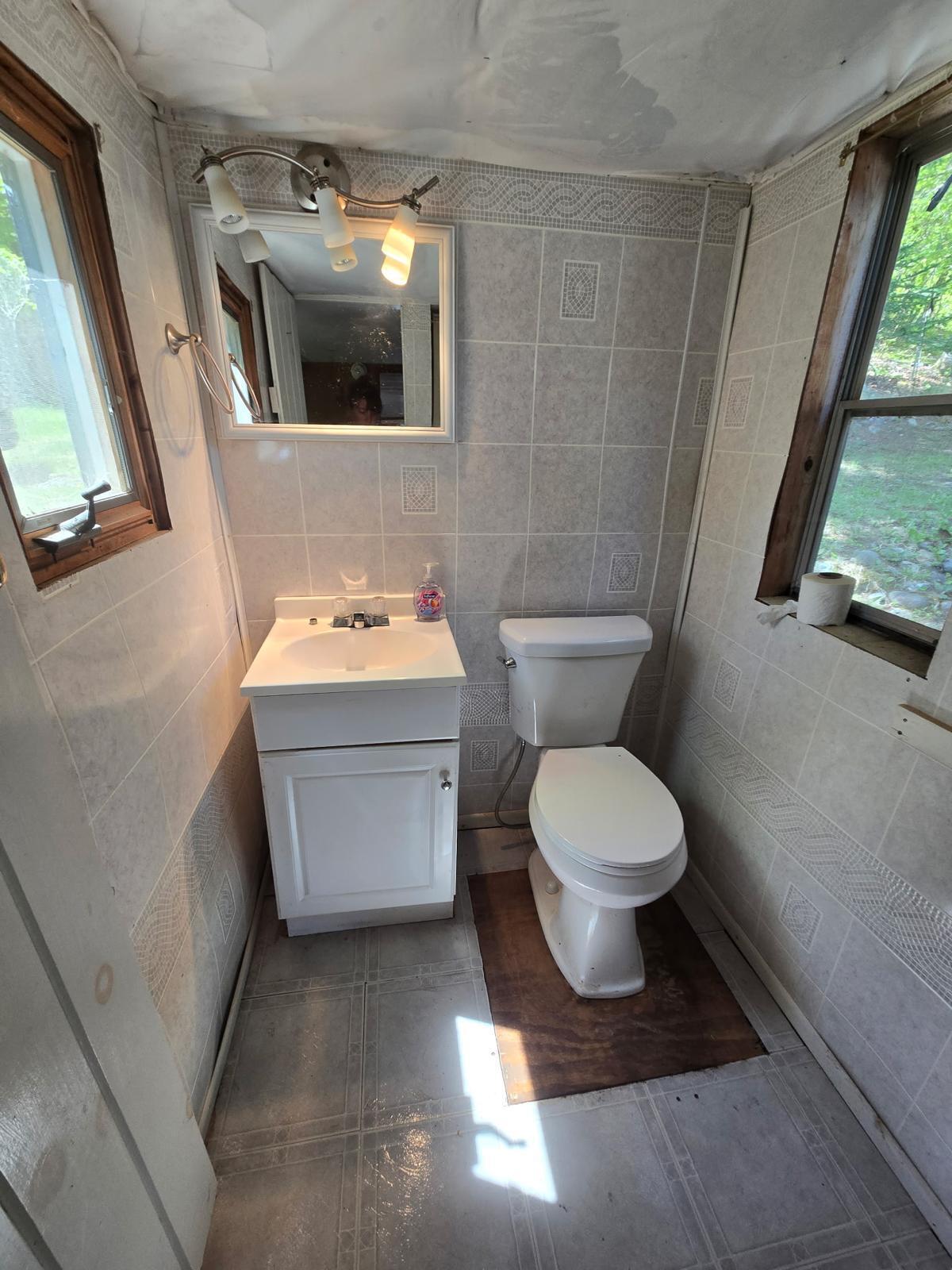 656 W Road Portage Lake, ME 04768 - Photo 23 of 24 Bathroom