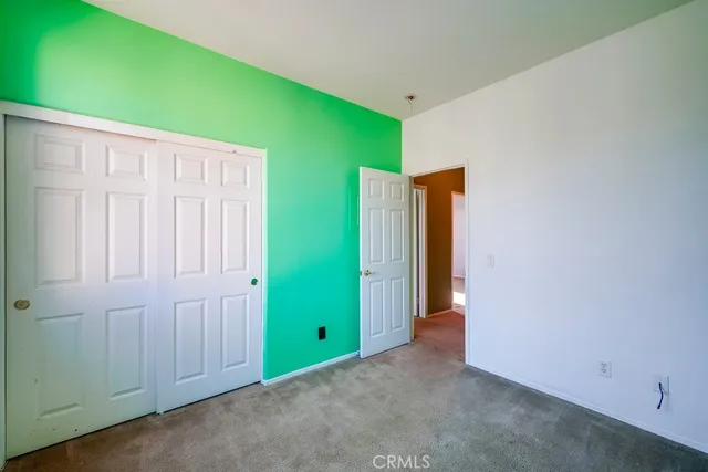 a front view of a building with garden