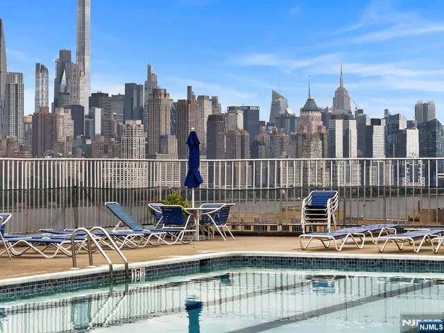 a view of a city with tall buildings