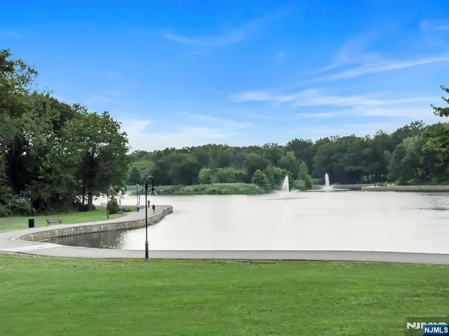 a view of a lake with a big yard