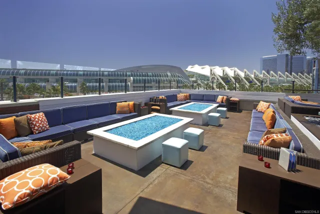 a view of swimming pool with seating area