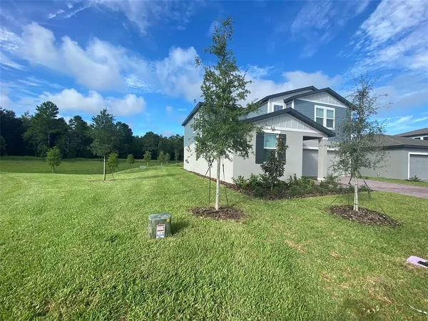 a house view with a garden space