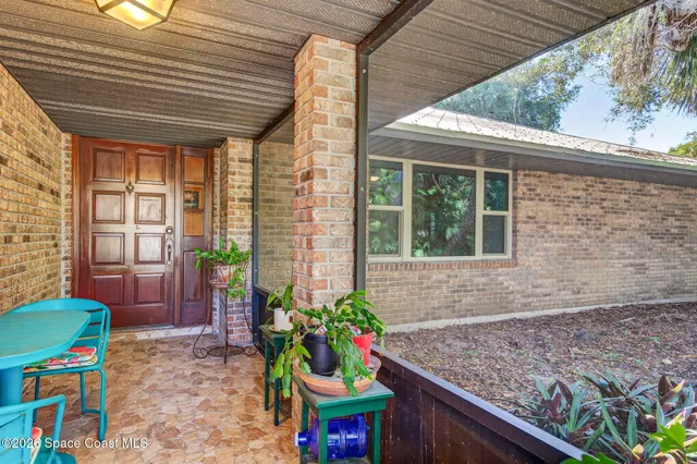 a front view of a house with a porch