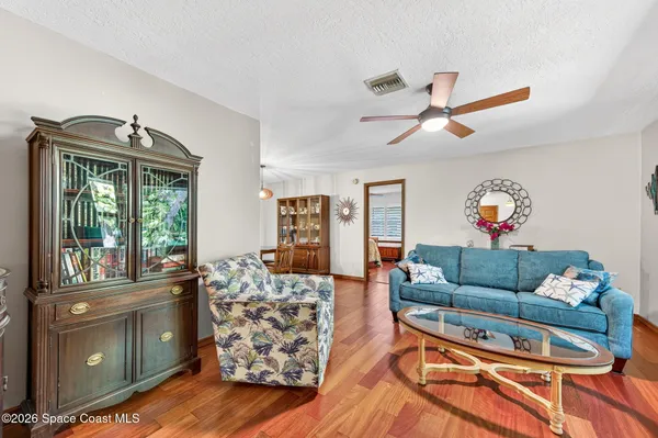 a living room with furniture and a couch