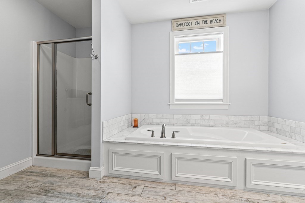 341 Hunnewell Street, Unit 341 Needham, MA 02494 - Photo 23 of 39 a bathroom with a sink and a bathtub