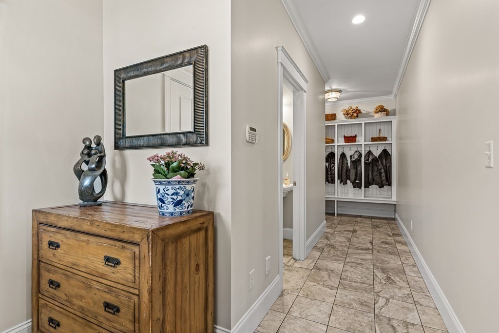 341 Hunnewell Street, Unit 341 Needham, MA 02494 - Photo 3 of 39 a view of hallway with mirror