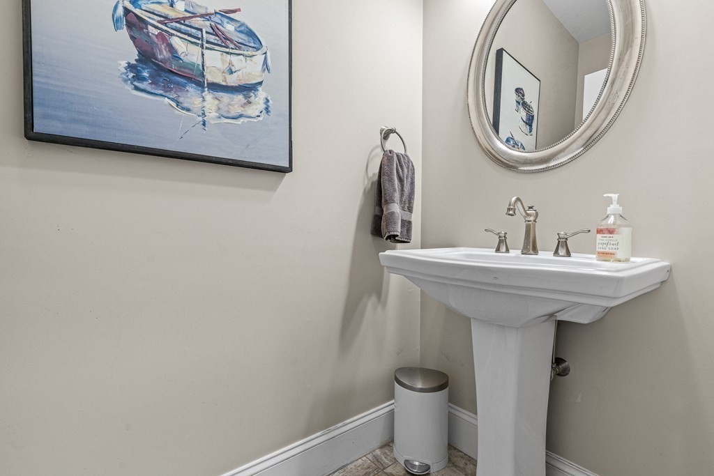 341 Hunnewell Street, Unit 341 Needham, MA 02494 - Photo 4 of 39 a bathroom with a toilet and a sink
