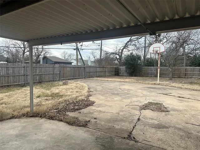 a view of backyard with tree
